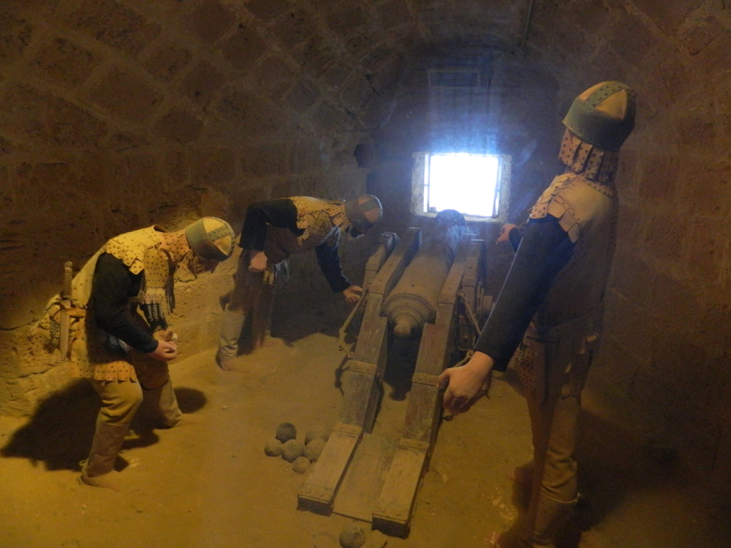 Venetian soldiers preparing to fire cannons